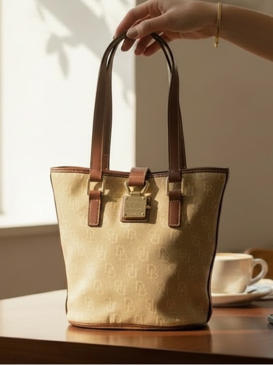 Dooney & Bourke Handbags - Dooney and Bourke Beige Canvas Bucket Tote with Brown Leather Trim